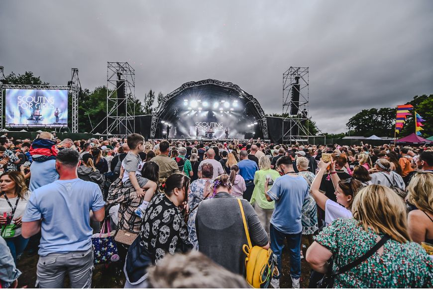 Big Crowd at concert with stage in background